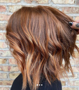 Auburn Red balayage color by expert colorist at Swerve Salon in Chicago