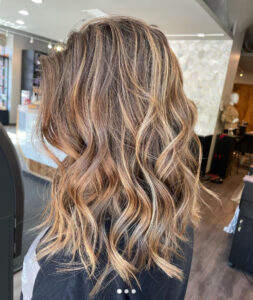  Strawberry blonde balayage by expert stylist at Swerve Salon in Chicago